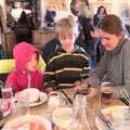 Isobel shows the boys some photos, Boxing Day in the Queen's Head, Eye, Suffolk - 26th December 2017