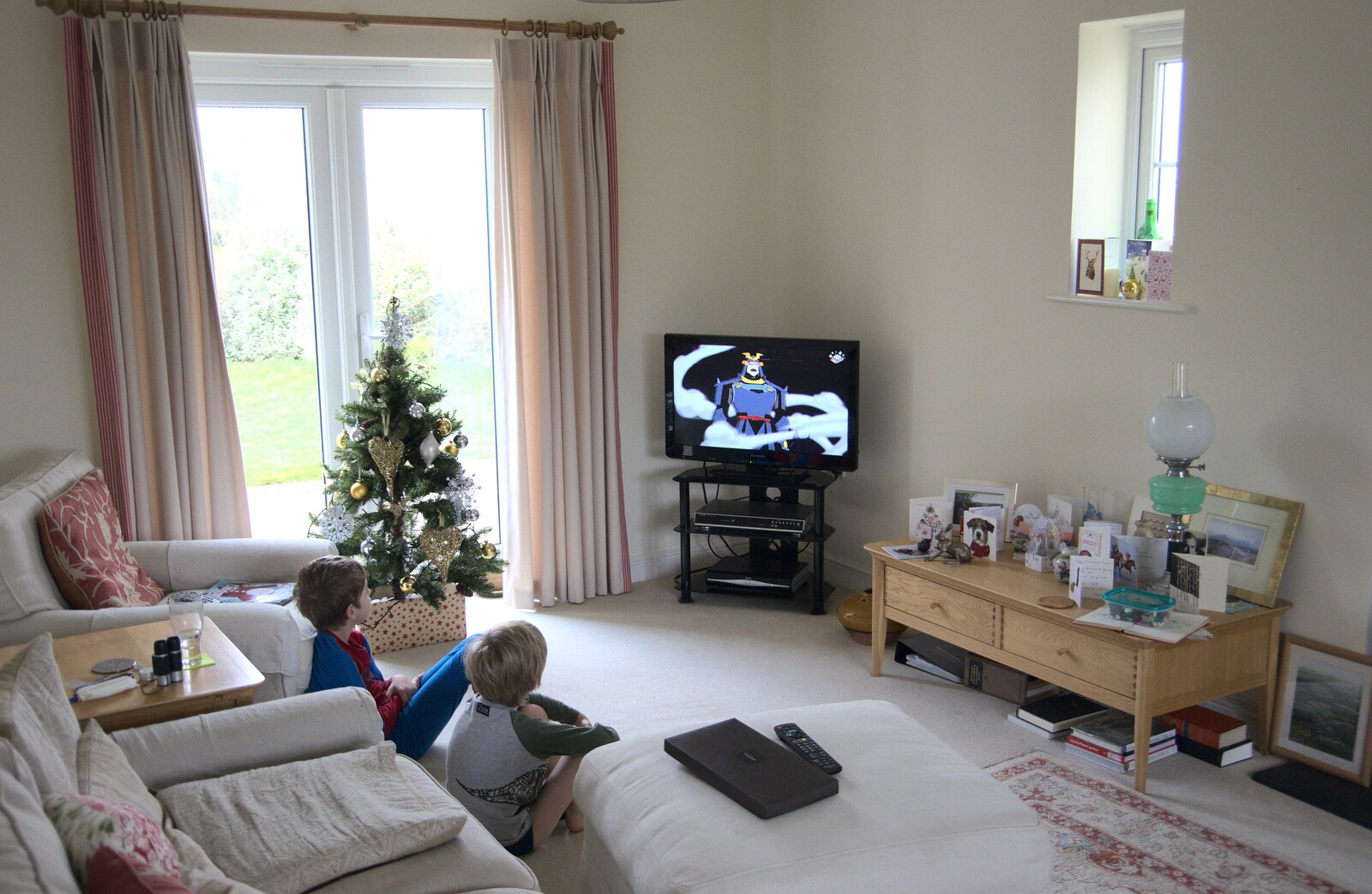 The boys watch some cartoon guff on Gradnma J's telly from An End-of-Year Trip to Spreyton, Devon - 29th December 2017