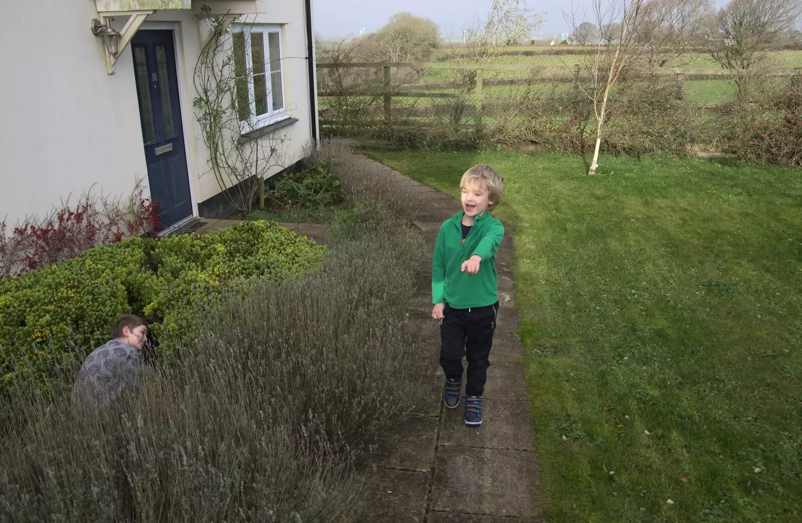 The boys hide-and-seek in the flower beds, from An End-of-Year Trip to Spreyton, Devon - 29th December 2017