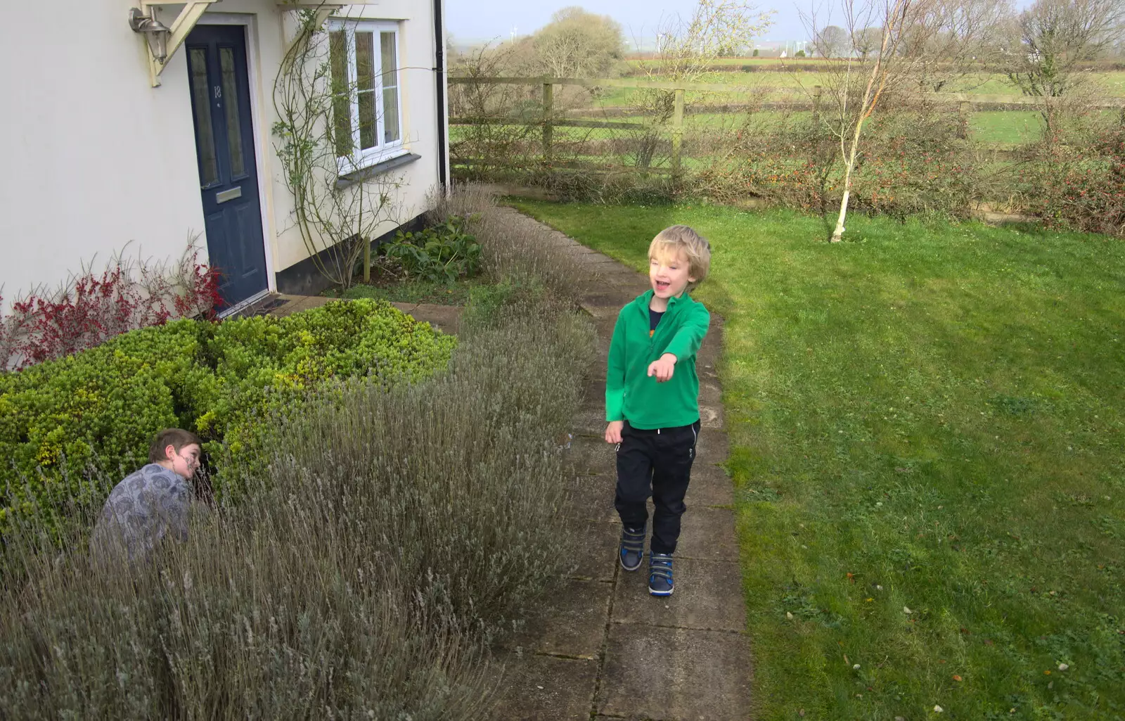 The boys hide-and-seek in the flower beds, from Killerton House, Broadclyst, Devon - 30th December 2017