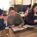 Isobel reads the menu to Harry, New Year's Eve in Spreyton, Devon - 31st December 2017