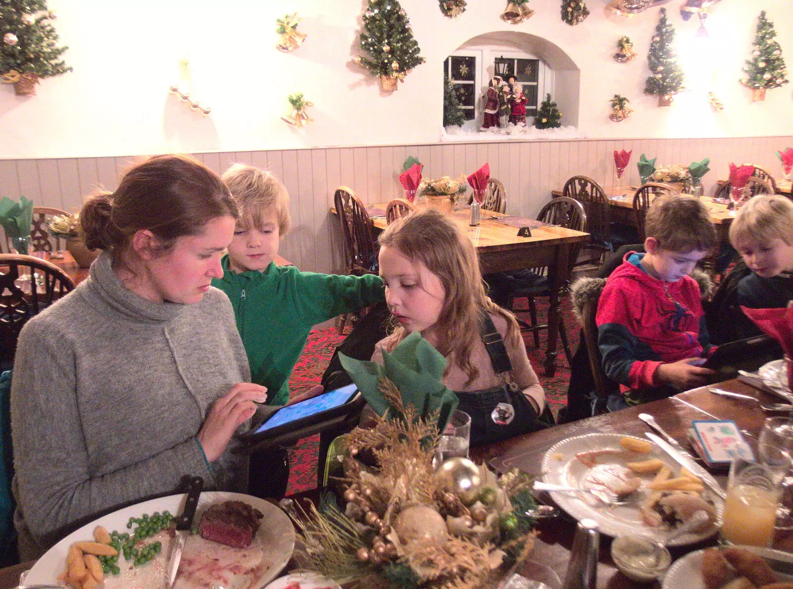 Isobel sets the tablet up, from New Year's Eve in Spreyton, Devon - 31st December 2017