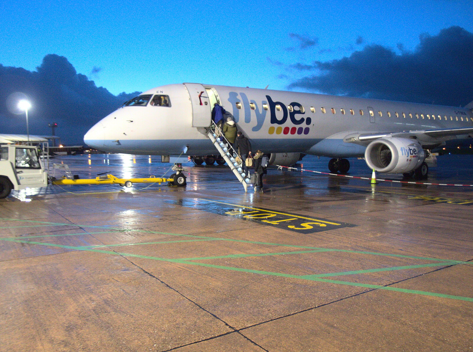 Passengers load up on the FlyBe Embraer from New Year's Eve in Spreyton, Devon - 31st December 2017