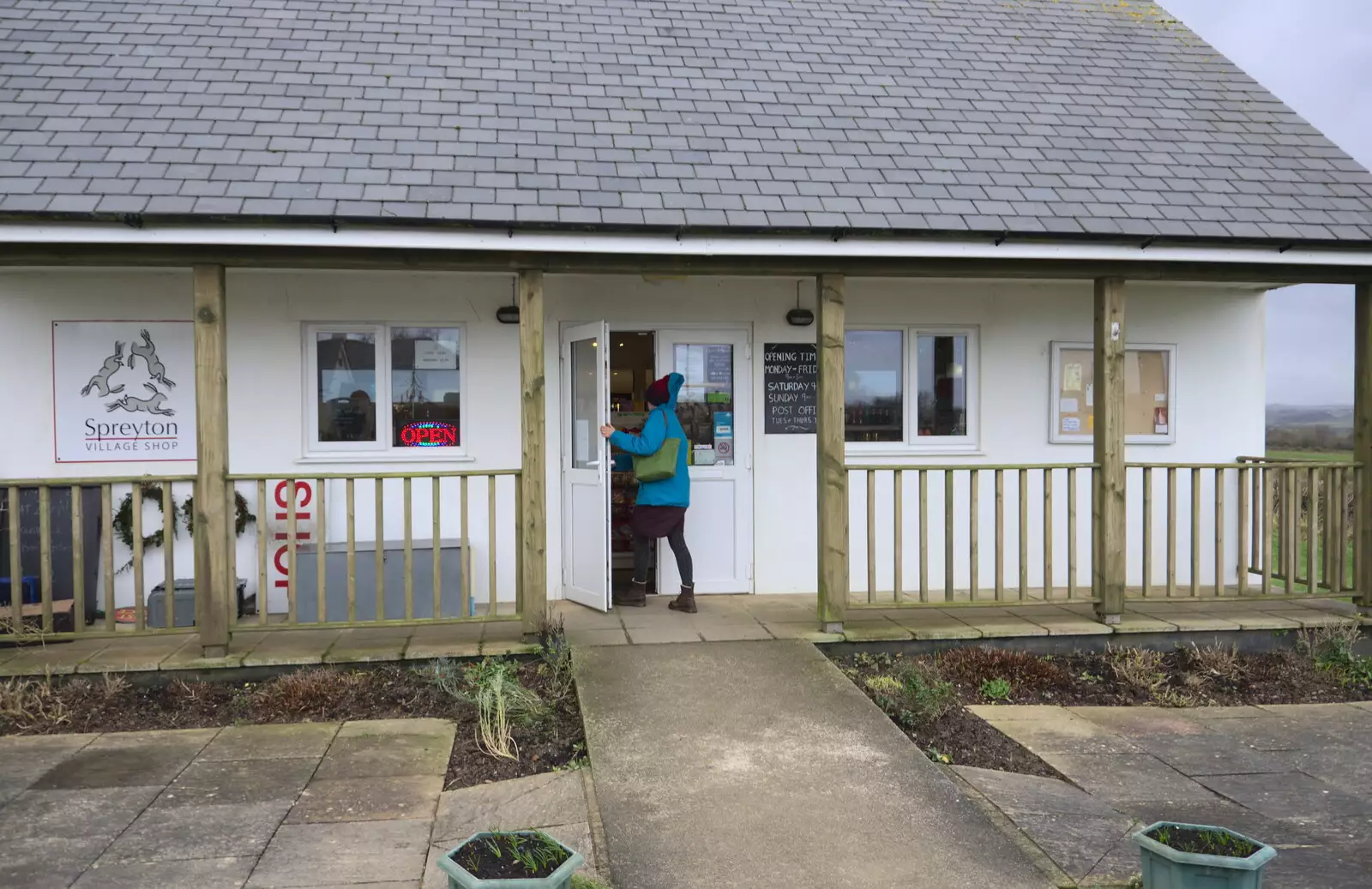 Isobel heads into the Spreyton village shop, from New Year's Eve in Spreyton, Devon - 31st December 2017