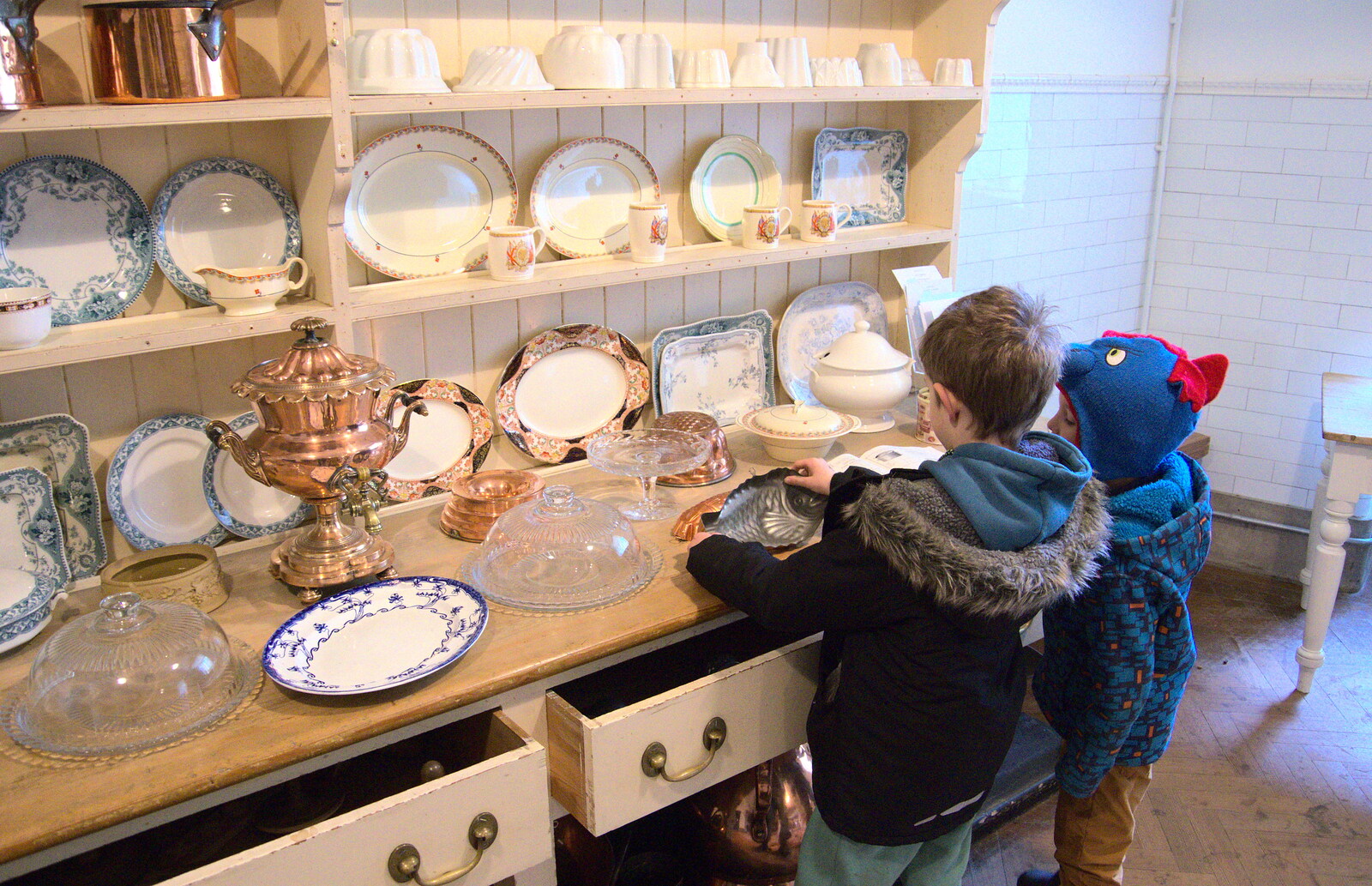The boys investigate 1920s kitchen moulds from Life Below Stairs, Ickworth House, Horringer, Suffolk - 28th January 2018