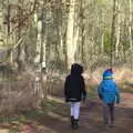 Fred and Harry walk off through the woods, A Return to Thornham Walks, Suffolk - 4th February 2018