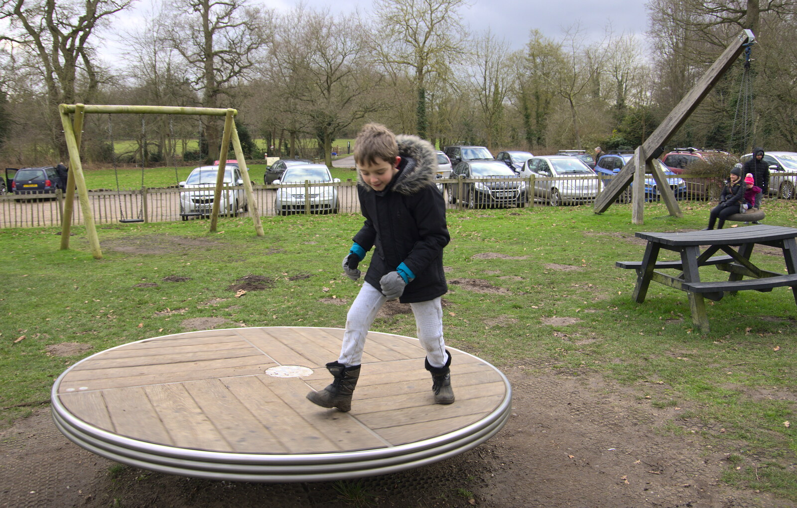 Fred spins the roundabout from A Return to Thornham Walks, Suffolk - 4th February 2018