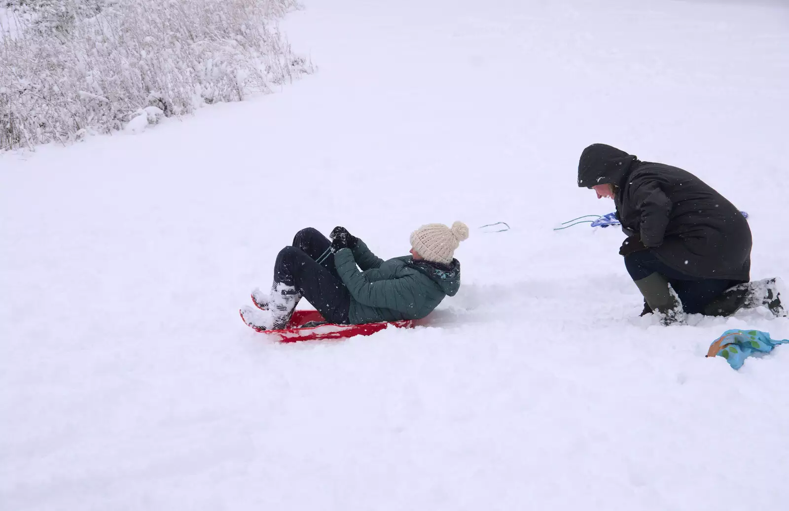 Isobel slides off, from The Beast From the East: Snow Days, Brome, Suffolk - 28th February 2018