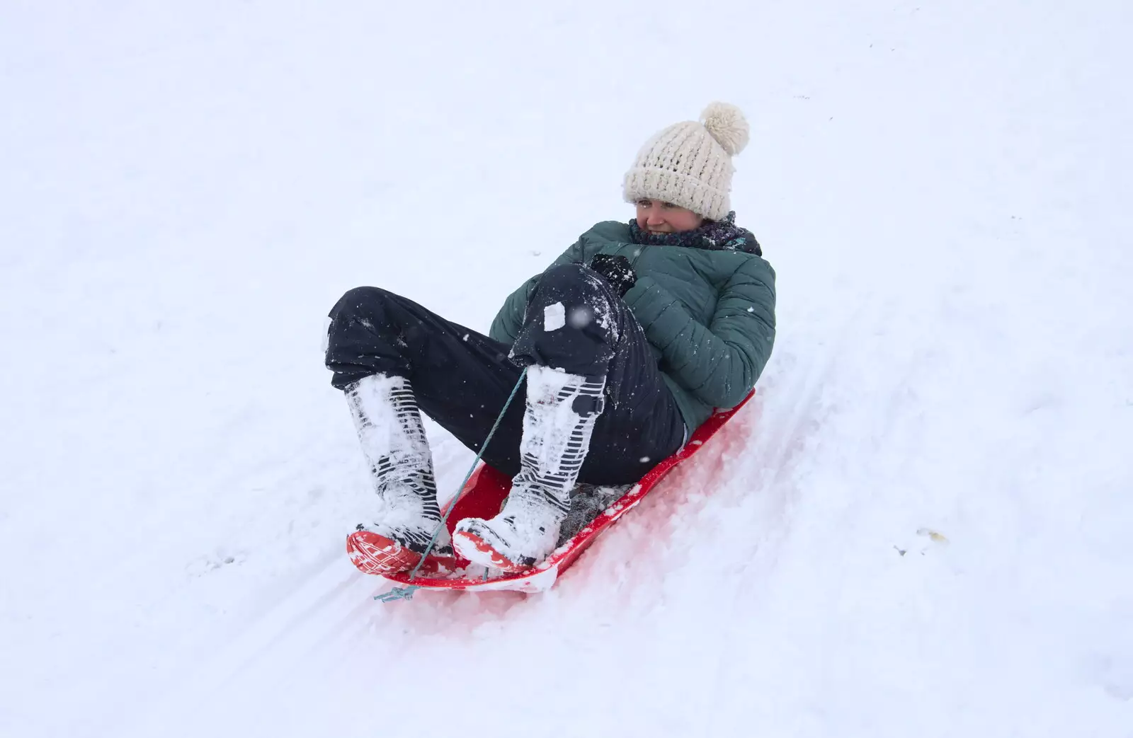 Isobel slides down the hill, from The Beast From the East: Snow Days, Brome, Suffolk - 28th February 2018