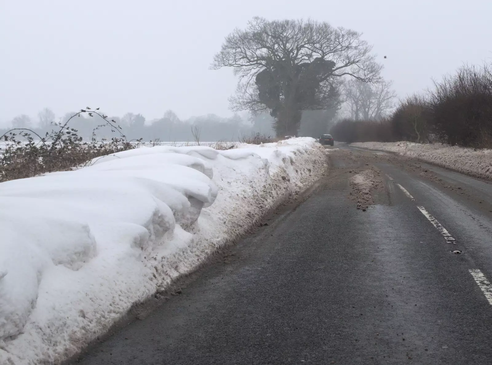 Snowdrifts encroach on the B1077, from More March Snow and a Postcard from Diss, Norfolk - 3rd March 2018