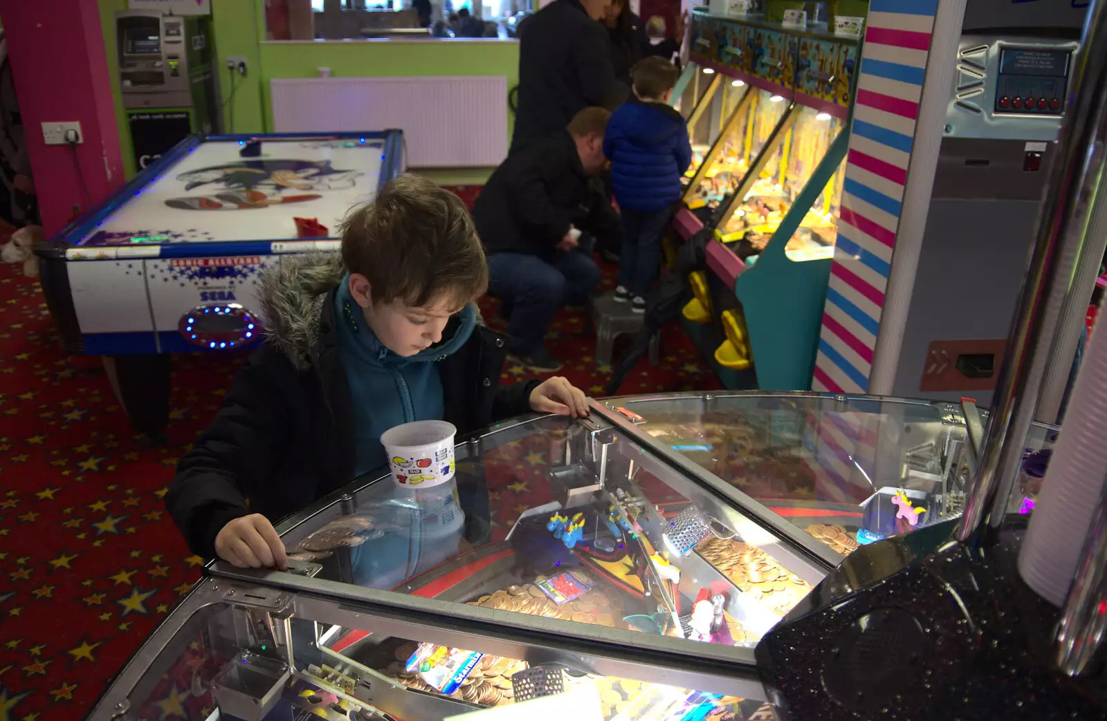 Fred's on the coin-shove machines again, from A Southwold Car Picnic, Southwold, Suffolk - 11th March 2018