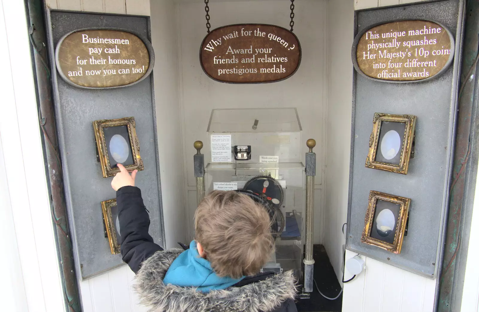 Fred checks out the coin-pressing machine, from A Southwold Car Picnic, Southwold, Suffolk - 11th March 2018