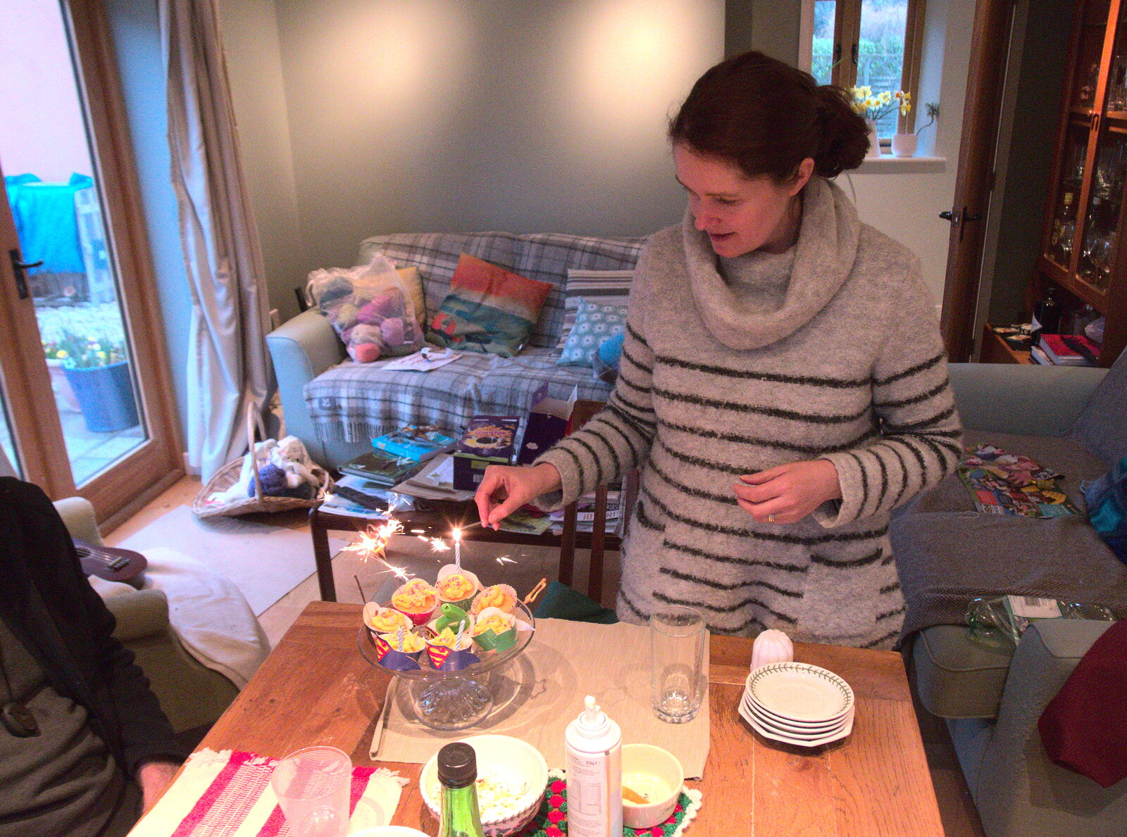 Isobel lights some candles from Trackside Graffiti, and Harry's Cake, London and Suffolk - 28th March 2018