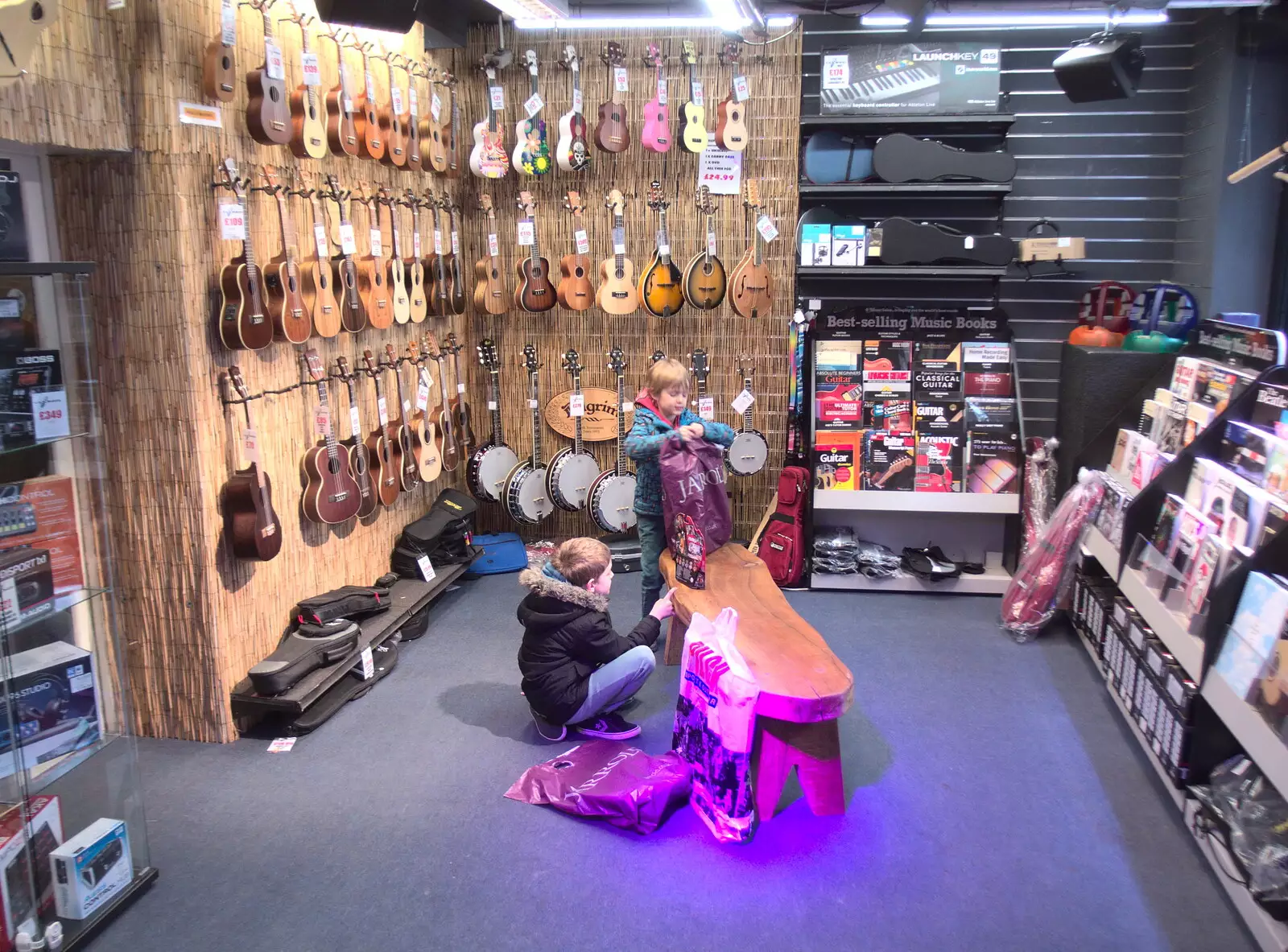 The boys mess around in Cooke's Band Instruments, from A Couple of Trips to Norwich, Norfolk - 31st March 2018