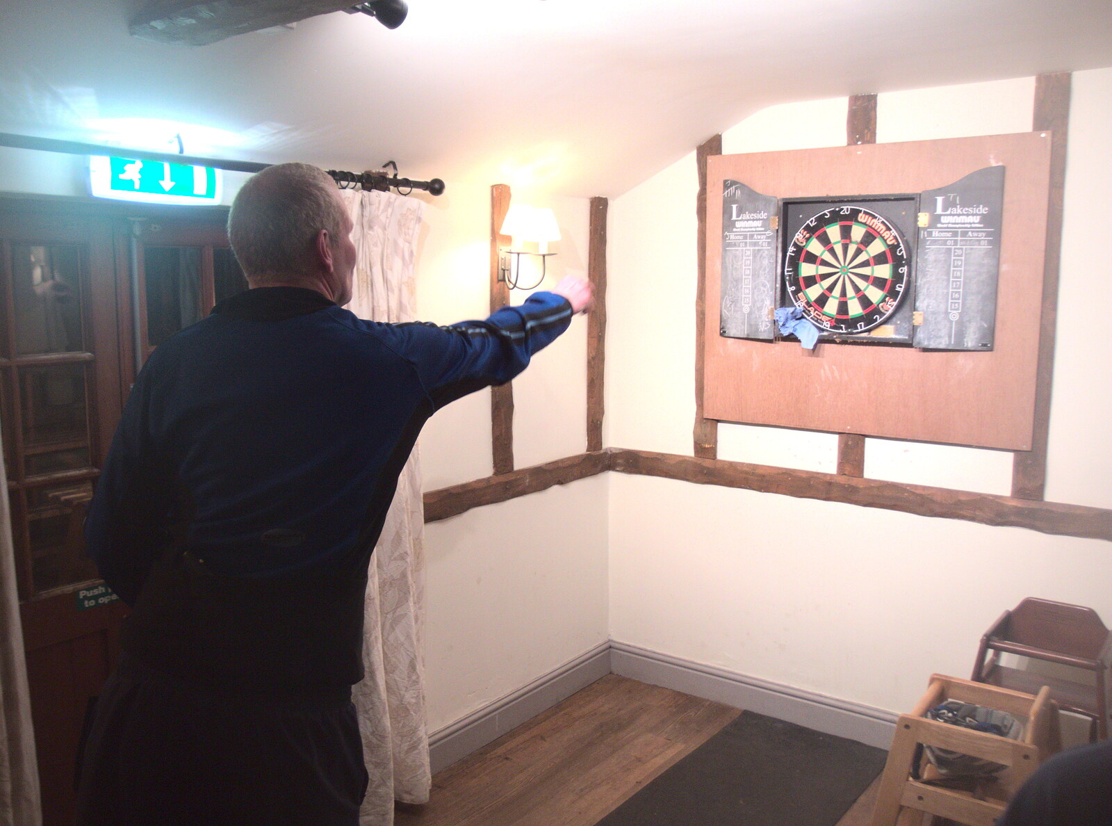 Bill lobs a dart, in the Beaconsfield Arms from Darts at the Beaky, and a Visit From Brussels, Occold and Thorndon, Suffolk - 9th April 2018