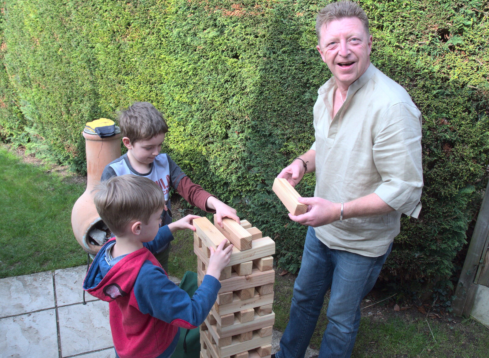 Gaz helps the boys build a block tower from An Afternoon Round Gaz and Sandie's, Eye, Suffolk - 14th April 2018
