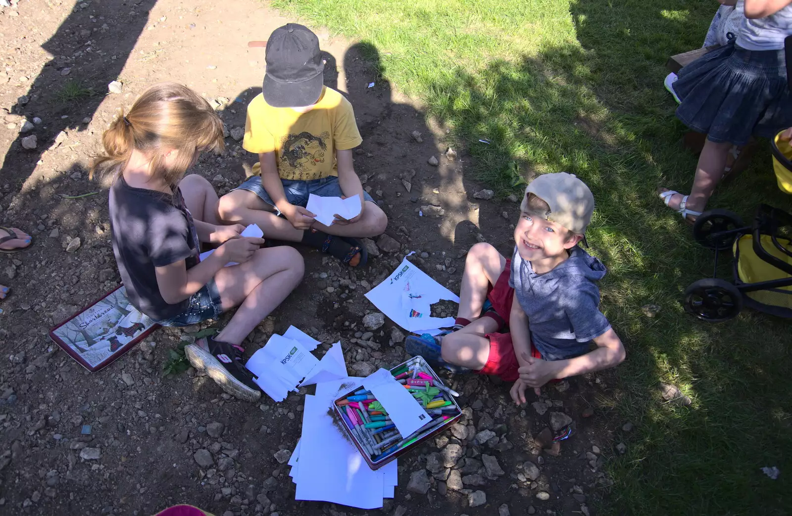 Harry and Fred mess around with paper, from Beer, Bikes and Bands, Burston Crown, Burston, Norfolk - 6th May 2018