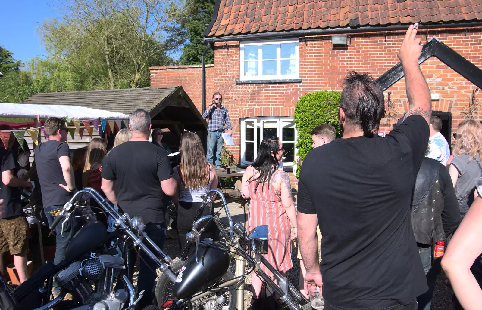 An auction takes place, from Beer, Bikes and Bands, Burston Crown, Burston, Norfolk - 6th May 2018