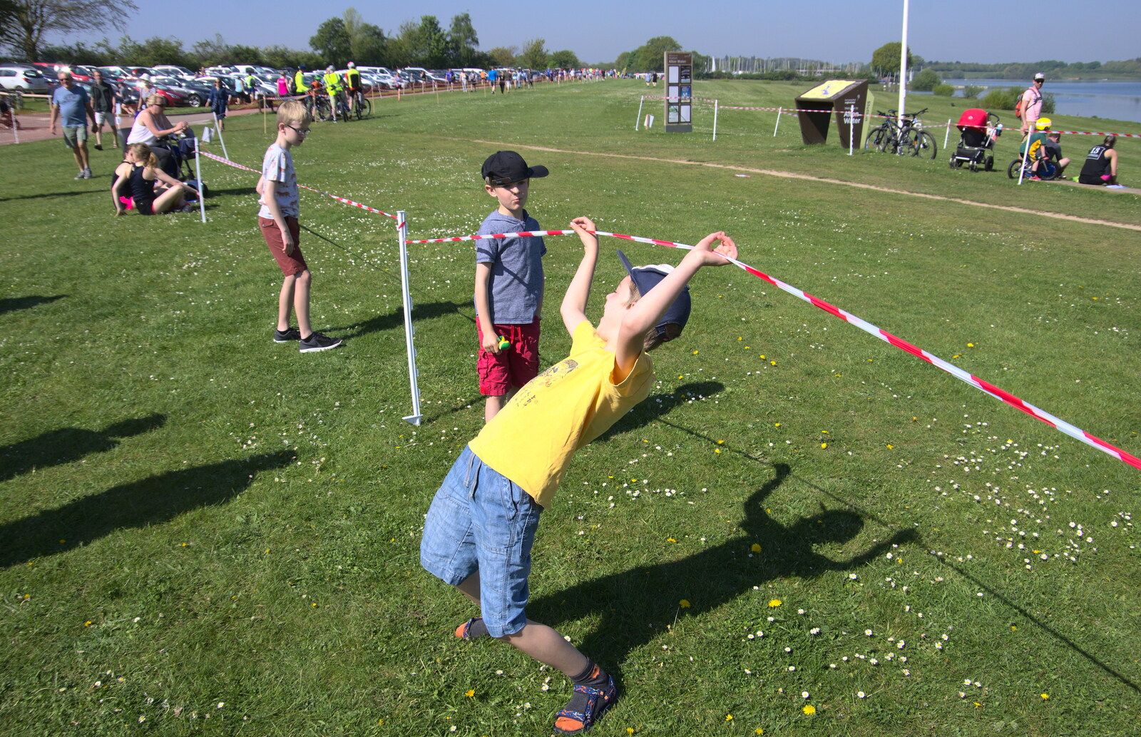 The boys do a spot of limbo from Isobel's 10km Run, Alton Water, Stutton, Suffolk - 6th May 2018