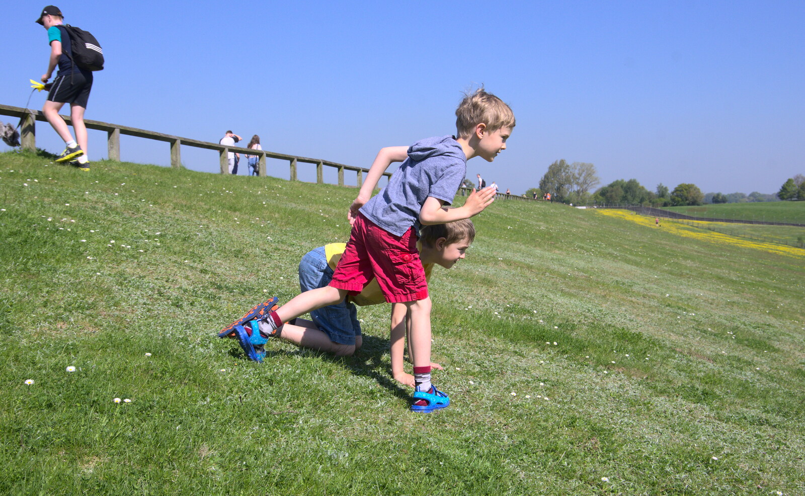 The boys have a race down the dam's earth bank from Isobel's 10km Run, Alton Water, Stutton, Suffolk - 6th May 2018