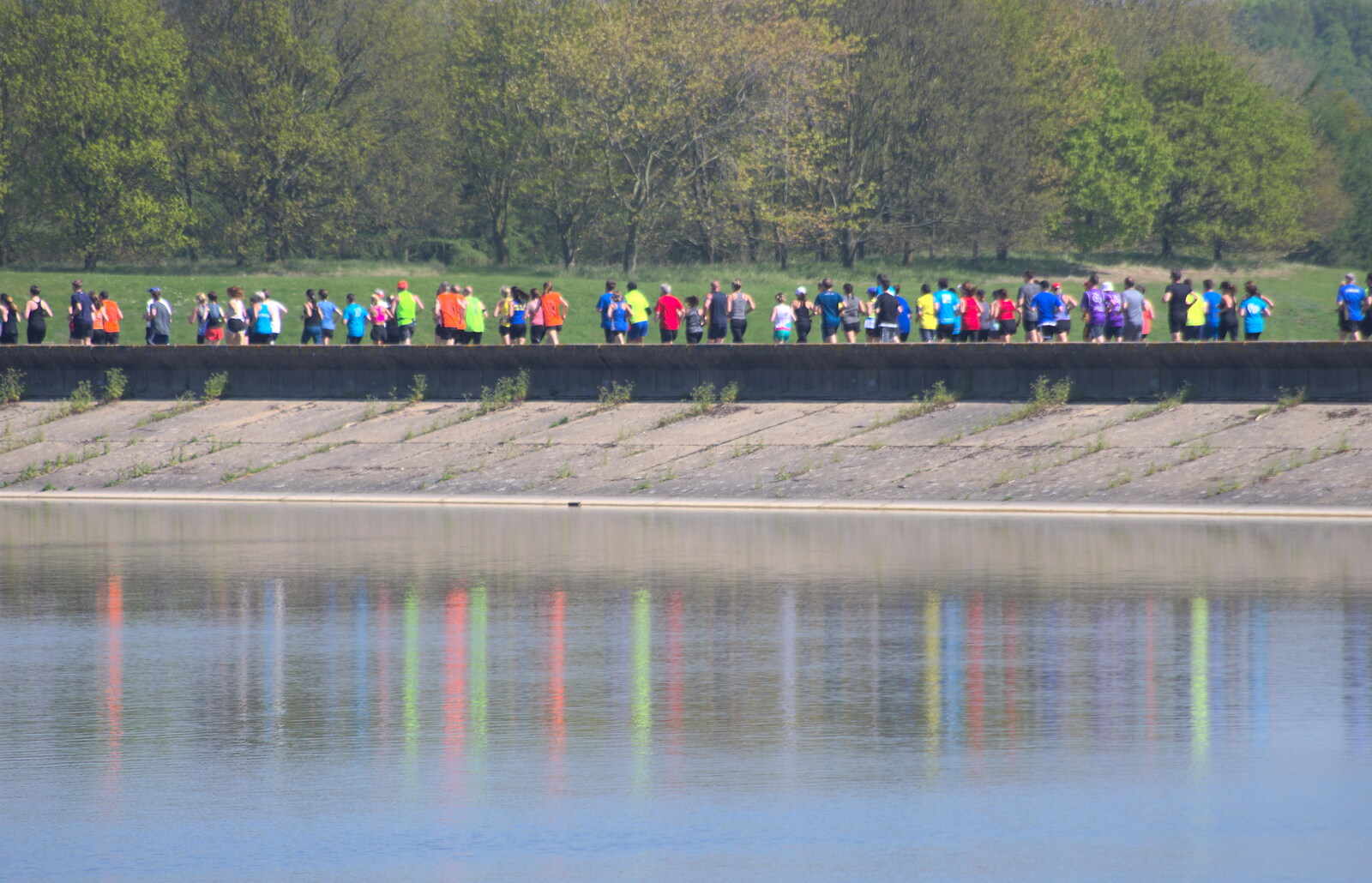 A flourescent barcode is reflected in the water from Isobel's 10km Run, Alton Water, Stutton, Suffolk - 6th May 2018