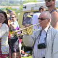 A runner gets a trumpet fanfare on finishing, Isobel's 10km Run, Alton Water, Stutton, Suffolk - 6th May 2018