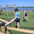 Isobel does some stretches, Isobel's 10km Run, Alton Water, Stutton, Suffolk - 6th May 2018