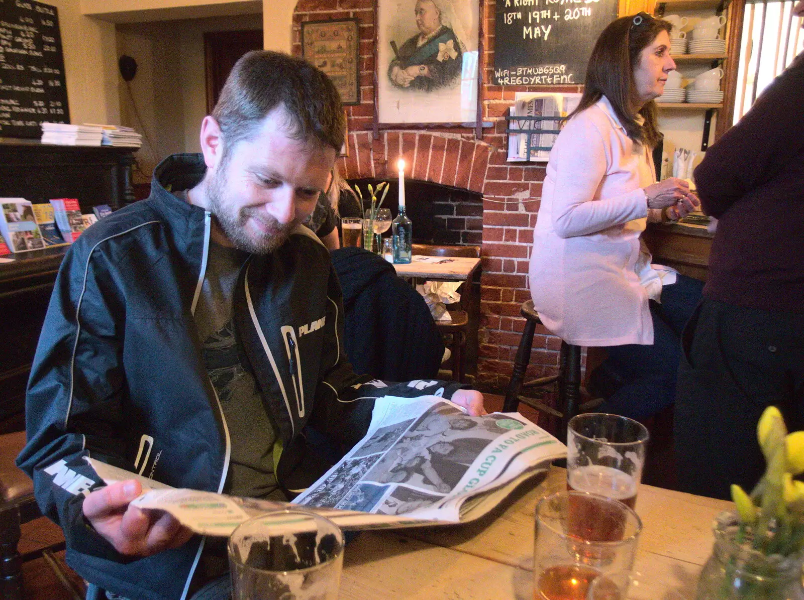 The Boy Phil reads the paper in The Victoria, from A Bike Ride to the Railway Tavern, Mellis, Suffolk - 7th May 2018