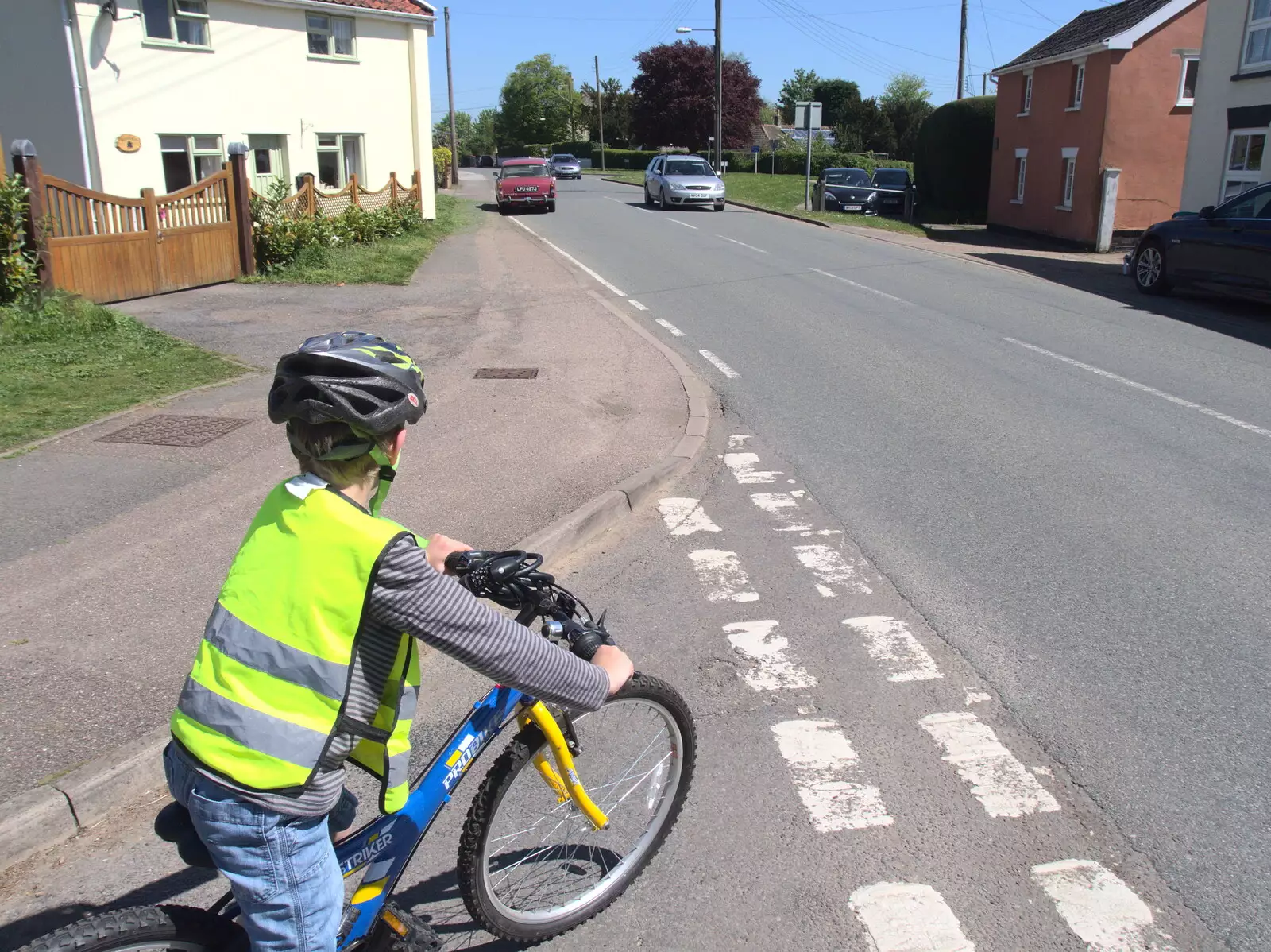 Fred waits to turn onto the main road, from A Bike Ride to the Railway Tavern, Mellis, Suffolk - 7th May 2018