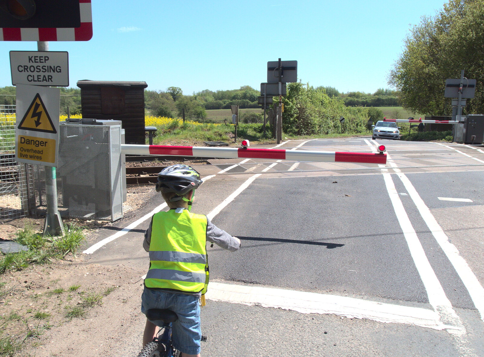 We wait at the level crossing from A Bike Ride to the Railway Tavern, Mellis, Suffolk - 7th May 2018