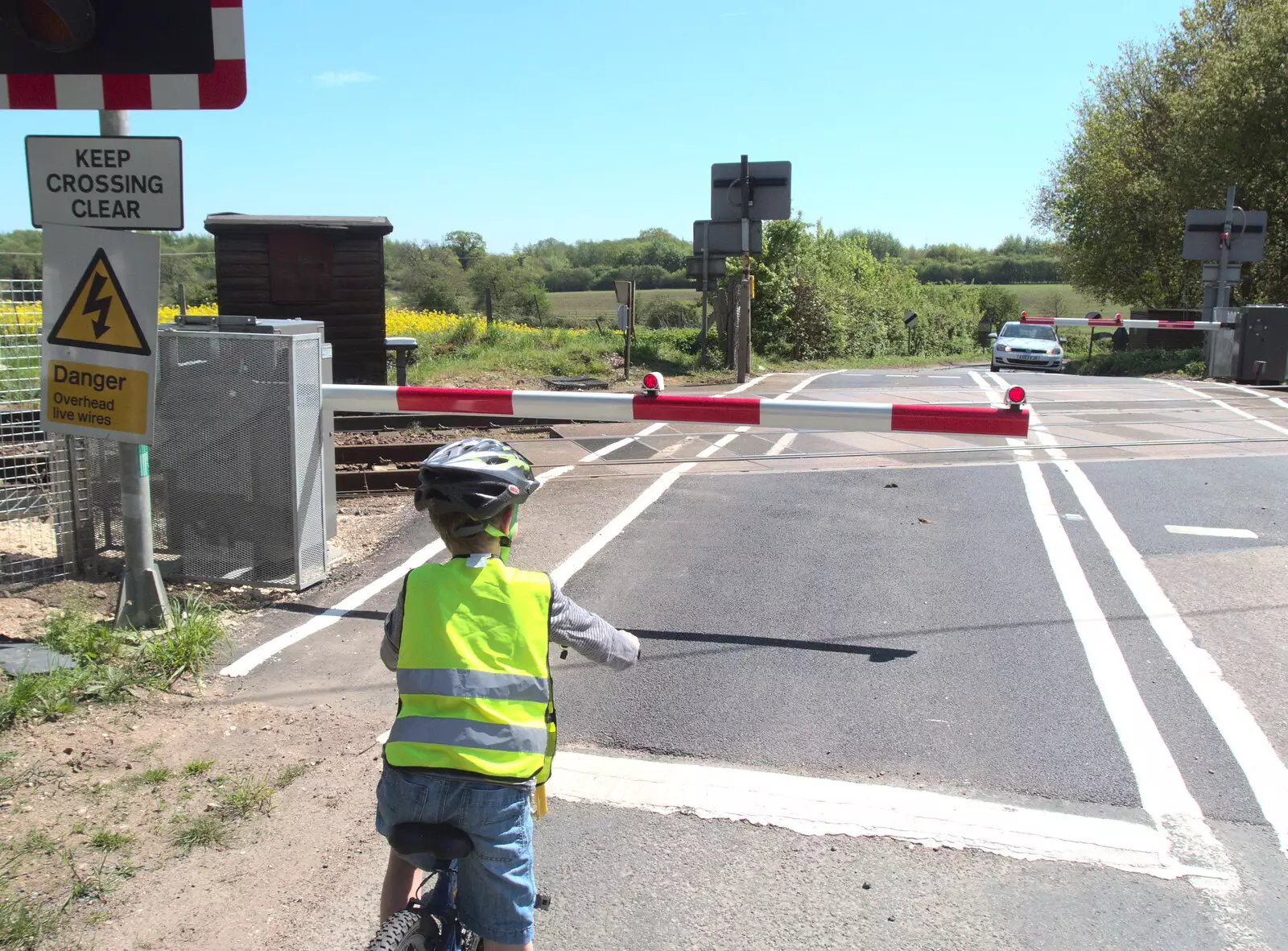 We wait at the level crossing, from A Bike Ride to the Railway Tavern, Mellis, Suffolk - 7th May 2018