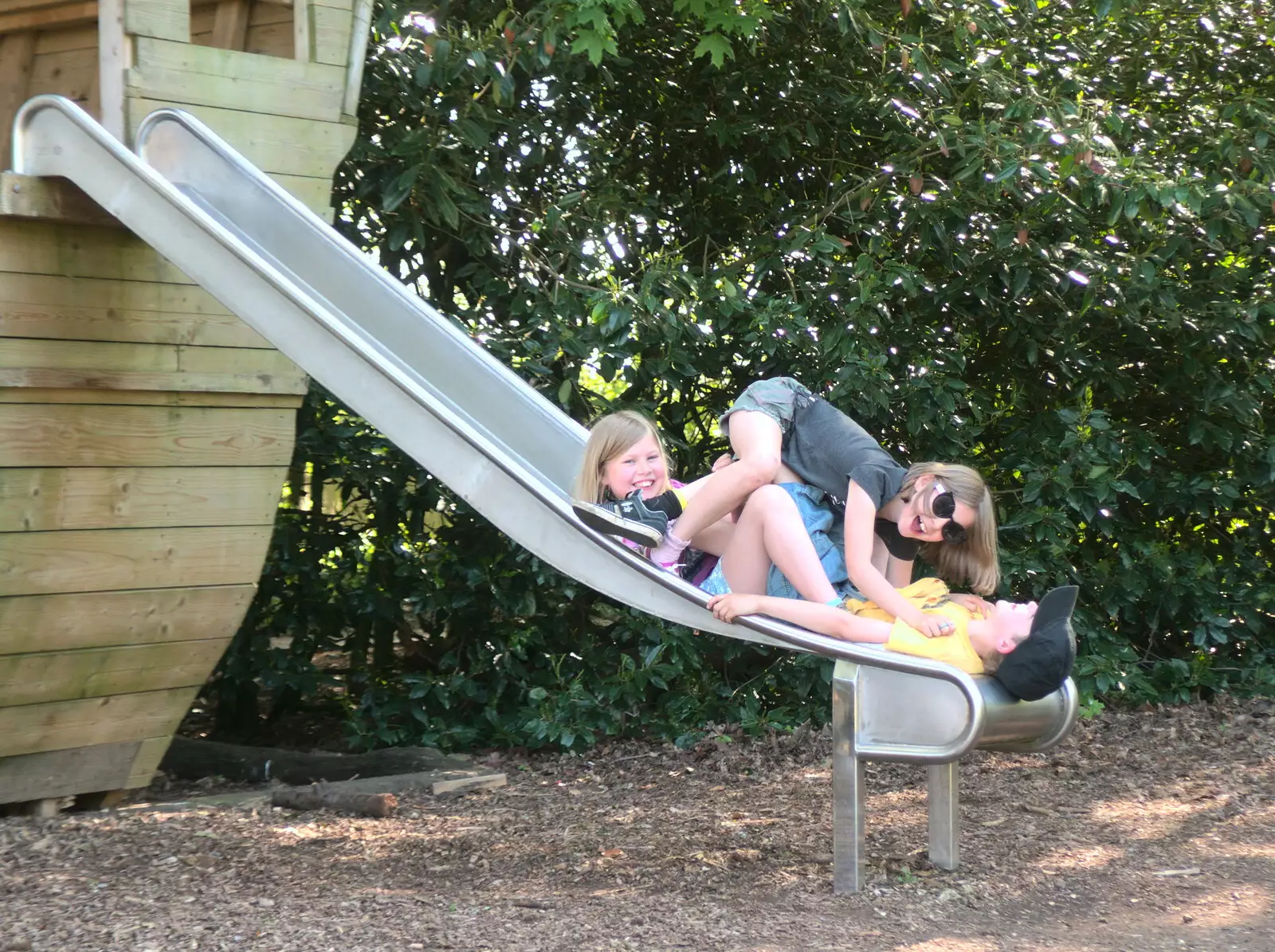 Fred's under a pile on the Oaksmere's slide, from A Bike Ride to the Railway Tavern, Mellis, Suffolk - 7th May 2018