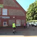 Paul pushes his bike around Budgens, The BSCC Weekend Away, Holt, Norfolk - 12th May 2018