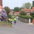 The Saga group head off past the wisteria, The BSCC Weekend Away, Holt, Norfolk - 12th May 2018