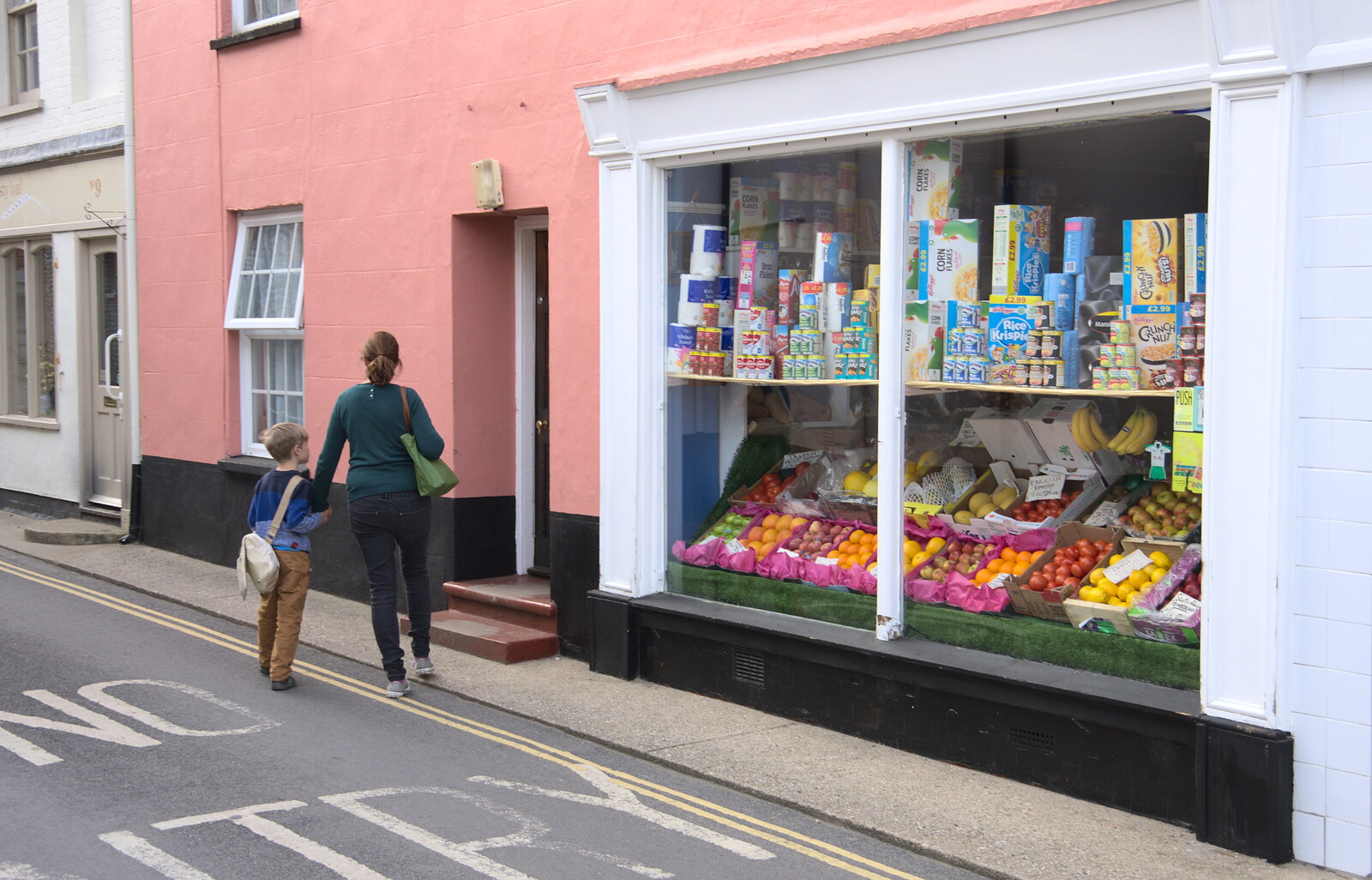 Harry and Isobel pass by a proper old-school shop from The BSCC Weekend Away, Holt, Norfolk - 12th May 2018