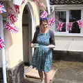 Isobel comes out with tea and a cake, A Right Royal Wedding at the Village Hall, Brome, Suffolk - 19th May 2018