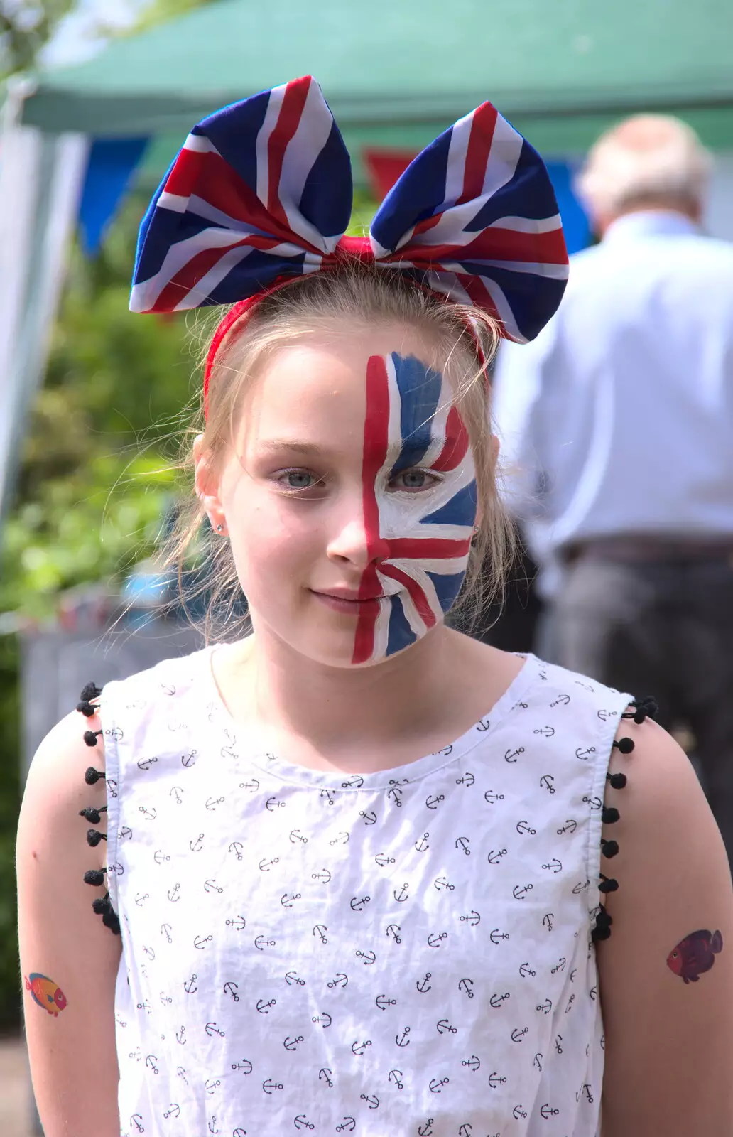 Eva's really into the spririt of it all, from A Right Royal Wedding at the Village Hall, Brome, Suffolk - 19th May 2018