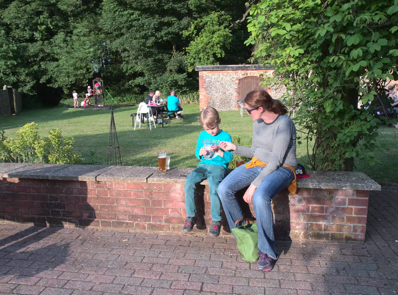 Harry and Isobel on a wall, from Dower House Camping, West Harling, Norfolk - 27th May 2018