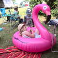 Grace lolls around in a big inflatable flamingo, Dower House Camping, West Harling, Norfolk - 27th May 2018