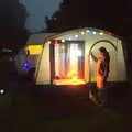 Isobel zips up the awning in the dusk, Dower House Camping, West Harling, Norfolk - 27th May 2018