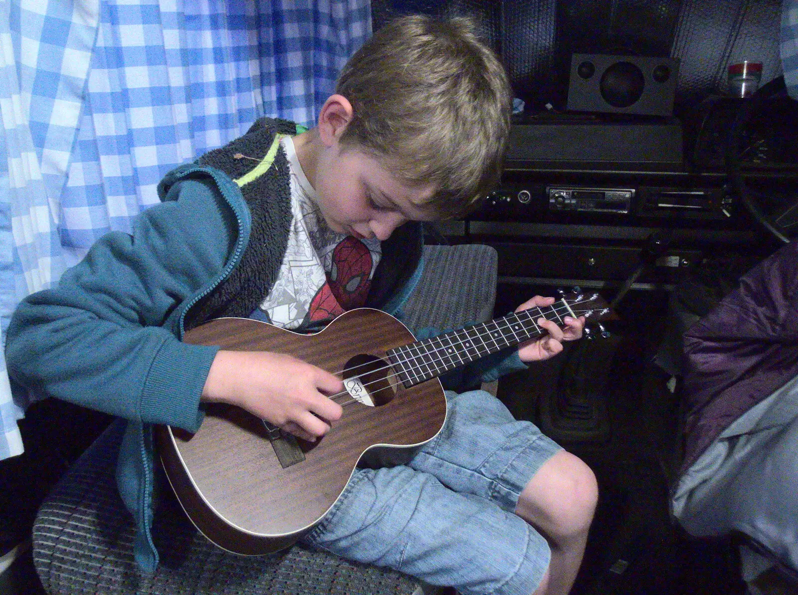 Fred plays a spot of tenor ukulele, from Dower House Camping, West Harling, Norfolk - 27th May 2018