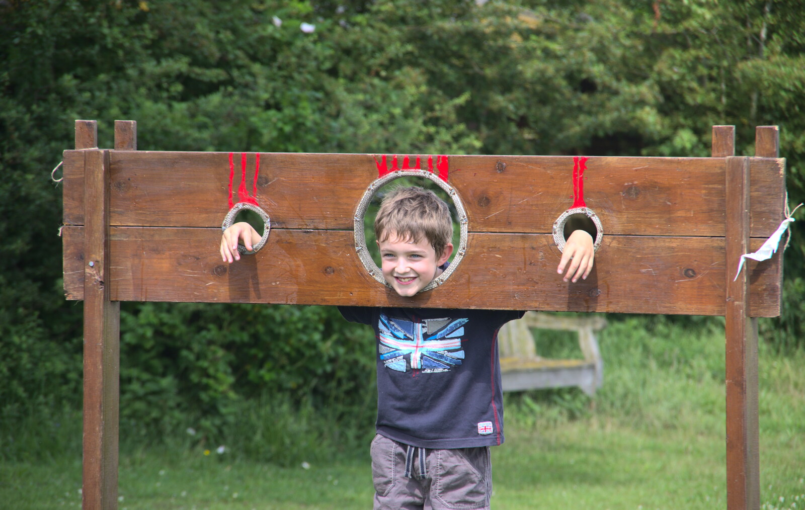 Fred volunteers for a session in the stocks from The Not-Opening of the Palgrave Playground, Palgrave, Suffolk - 3rd June 2018