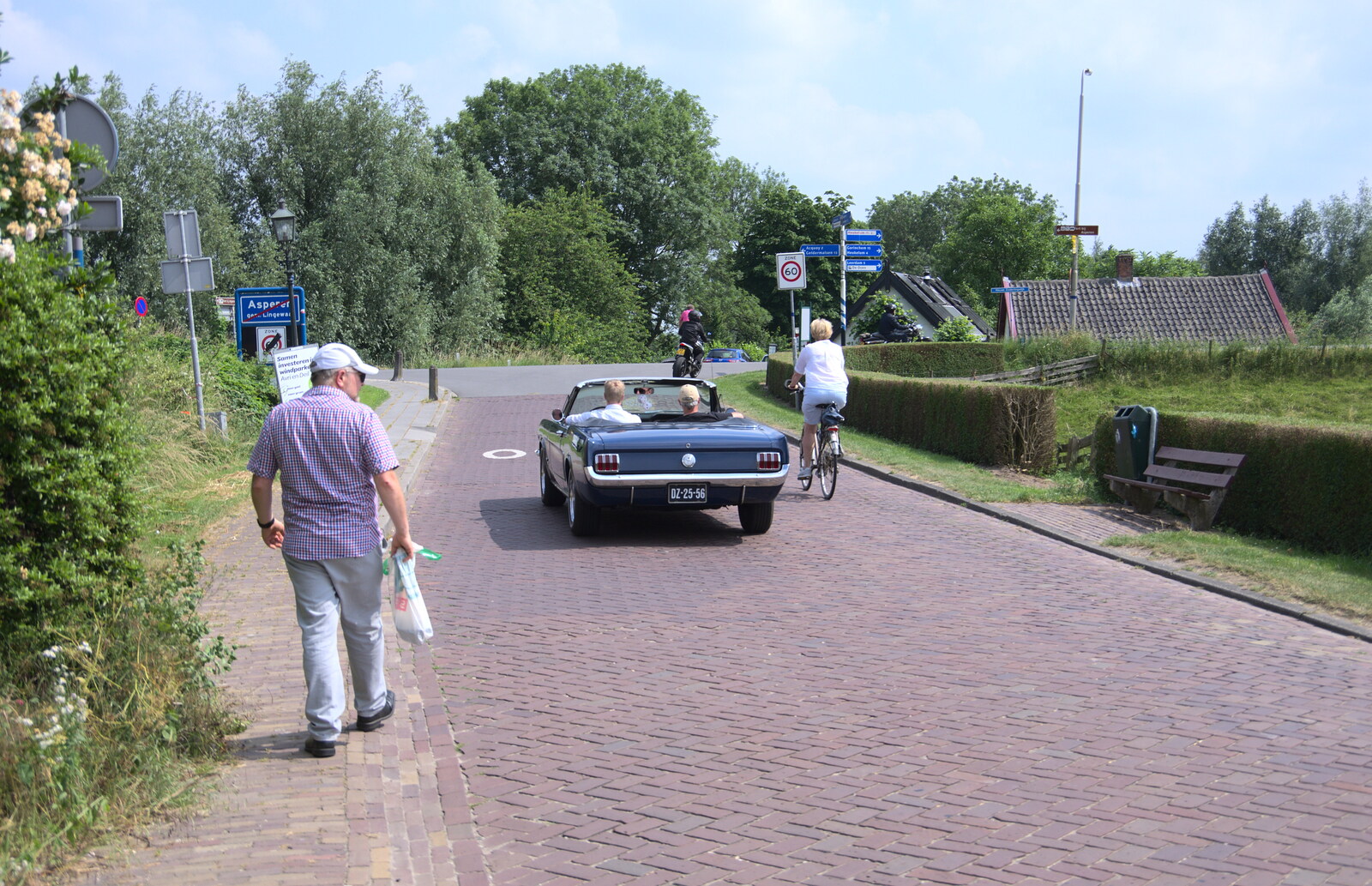 Another classic car drives by from A Postcard From Asperen, Gelderland, Netherlands - 9th June 2018