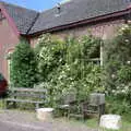 A house by Nieuwe Zuiderlingedijk is a bit overgrown, A Postcard From Asperen, Gelderland, Netherlands - 9th June 2018