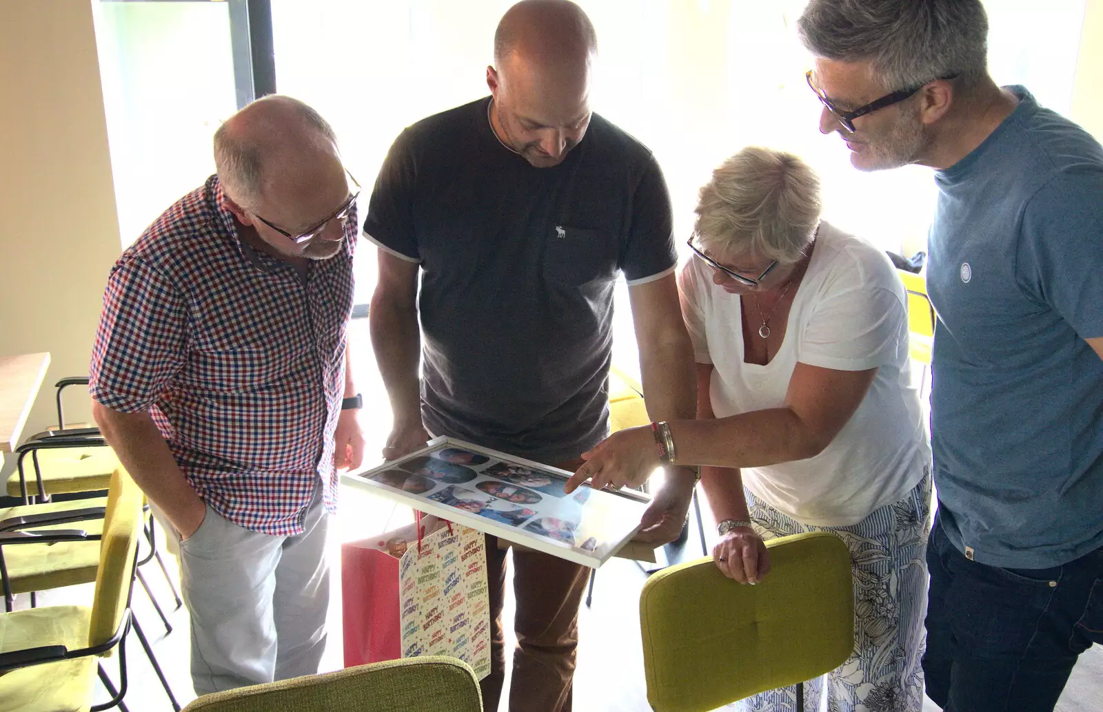 Hamish and Martin scope out old photos, from A Postcard From Asperen, Gelderland, Netherlands - 9th June 2018