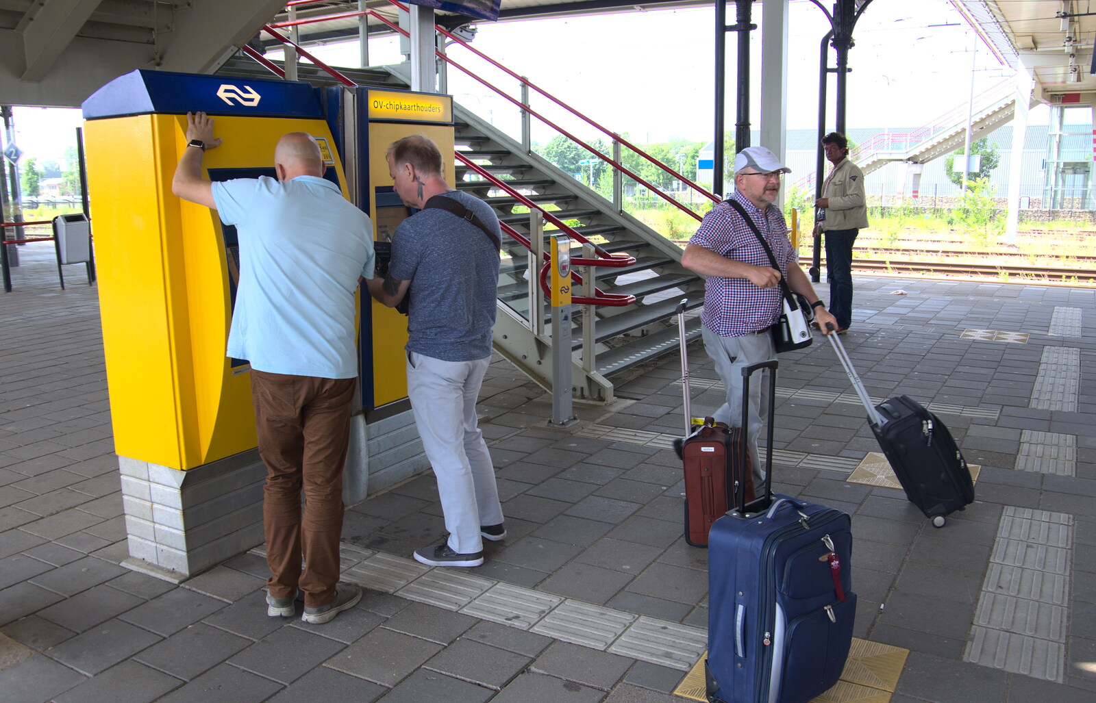 Martin helps us get some train tickets from Martin's James Bond 50th Birthday, Asperen, Gelderland, Netherlands - 9th June 2018