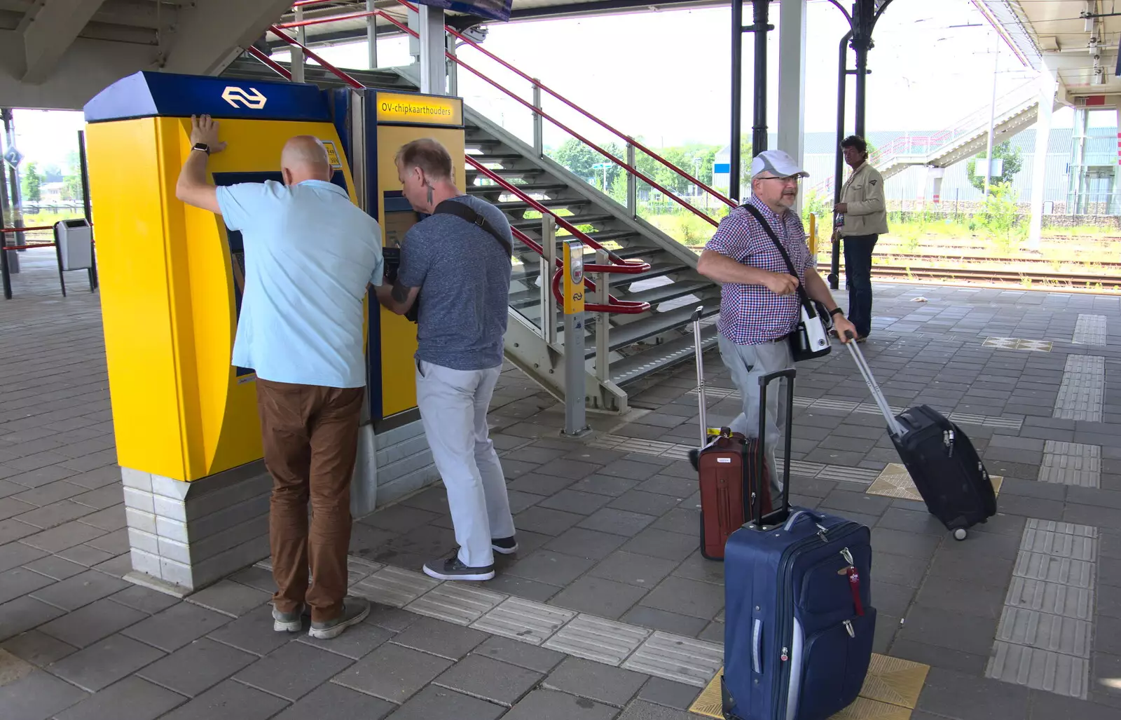 Martin helps us get some train tickets, from Martin's James Bond 50th Birthday, Asperen, Gelderland, Netherlands - 9th June 2018