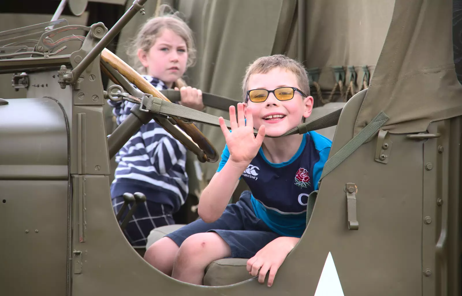 Someone waves from the truck, as Amelia looks on, from The Formerly-Known-As-The-Eye-Show, Palgrave, Suffolk - 17th June 2018