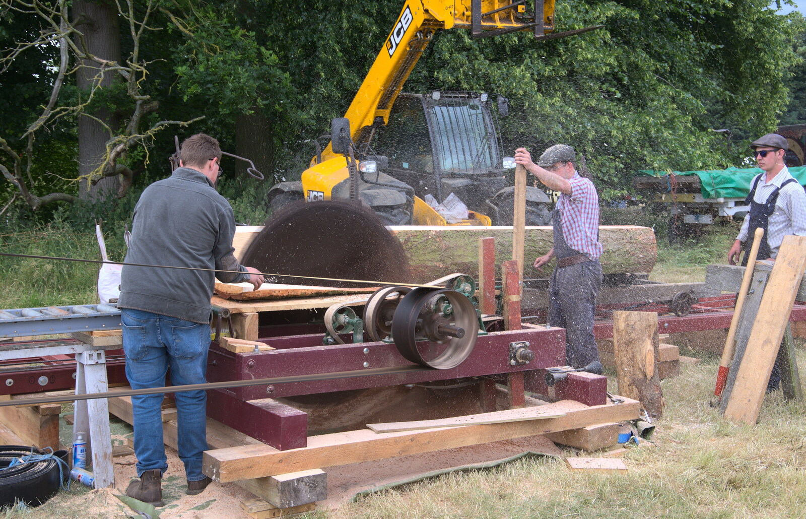 Sawdust flies at the steam-driven saw from The Formerly-Known-As-The-Eye-Show, Palgrave, Suffolk - 17th June 2018