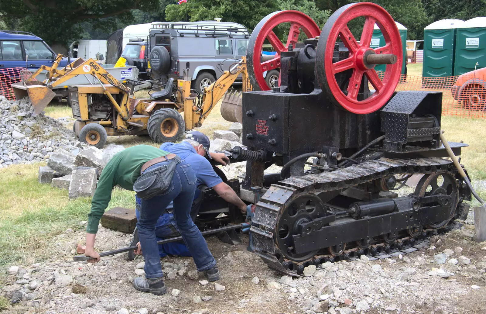 An engine is poked with an iron rod, from The Formerly-Known-As-The-Eye-Show, Palgrave, Suffolk - 17th June 2018